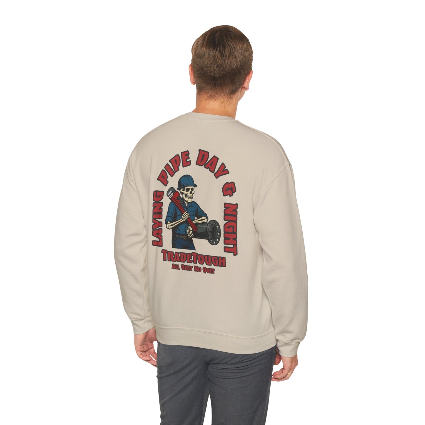 Beige sweatshirt with graphic design on the back, worn by a person on a white background