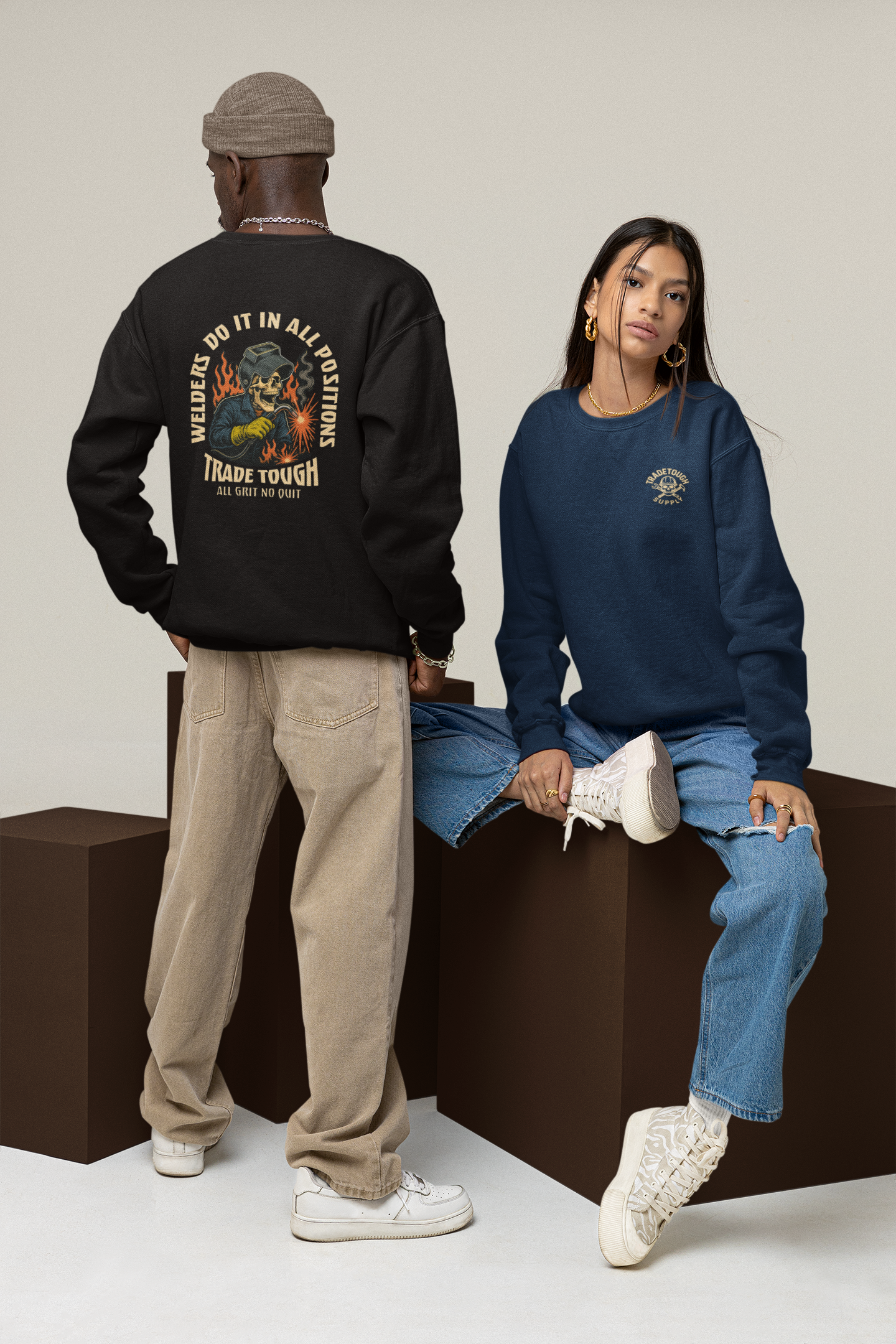 Model wearing a crewneck with a detailed back print of a welder skeleton mid-strike