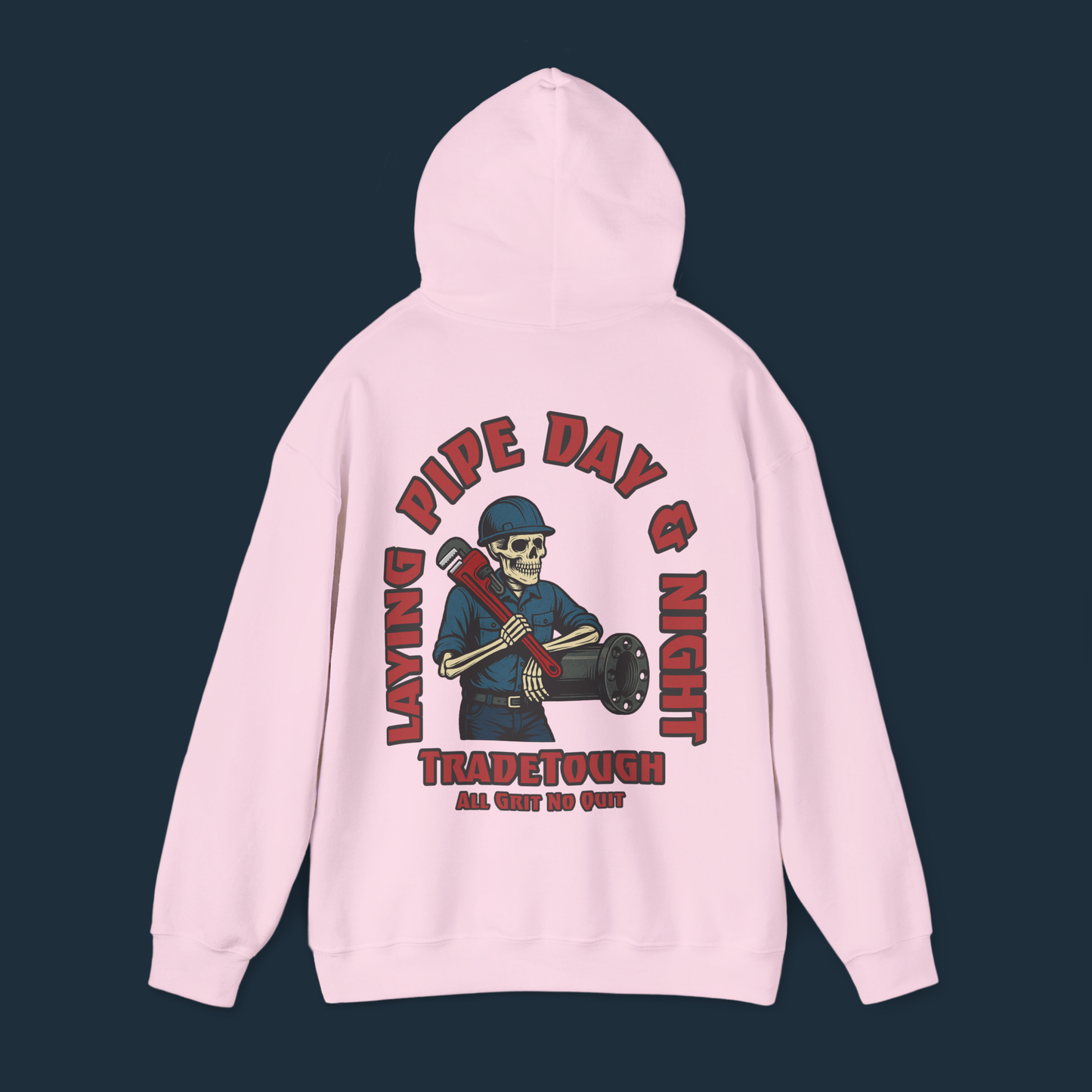 Back of pink hoodie featuring skeleton leaning on flanged pipe with gritty text