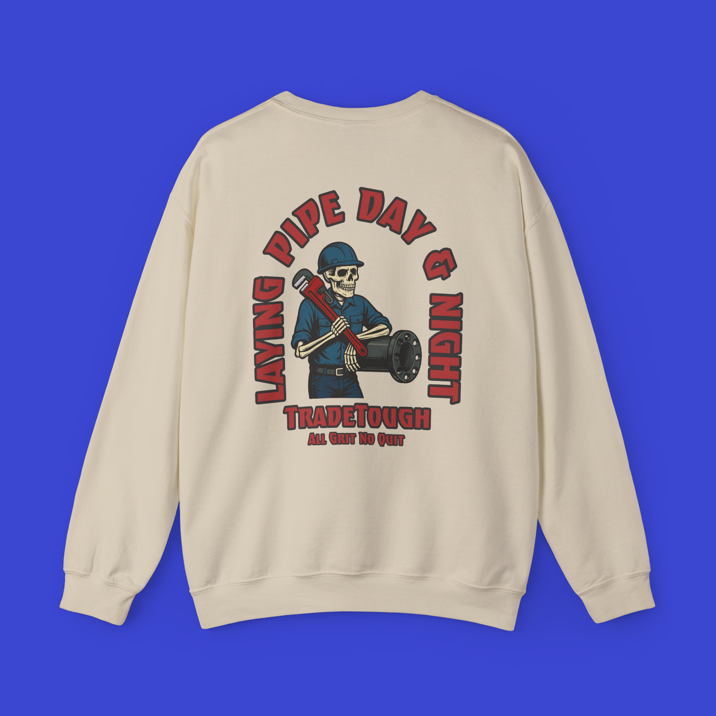 Sand crewneck showing full-back graphic of skeleton leaning on flanged pipe