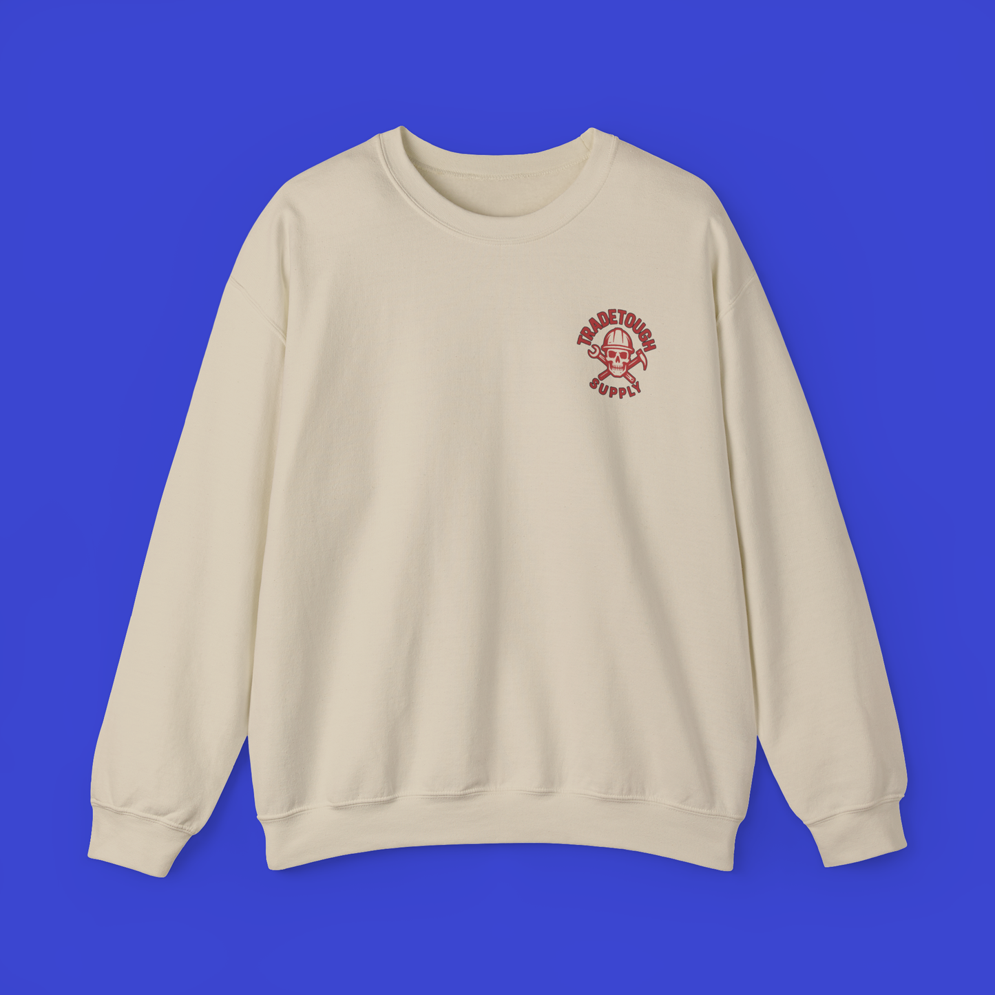 Flat lay of sand-colored crewneck with minimal TradeTough logo on front