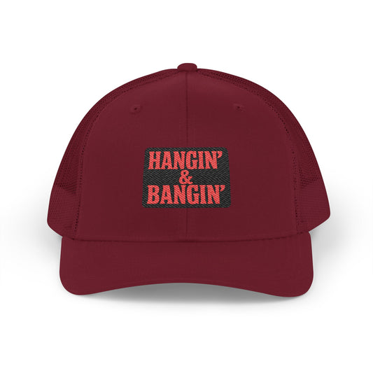 Cardinal red Richardson 112 mesh-back hat with bold red and black patch – tradesman workwear cap