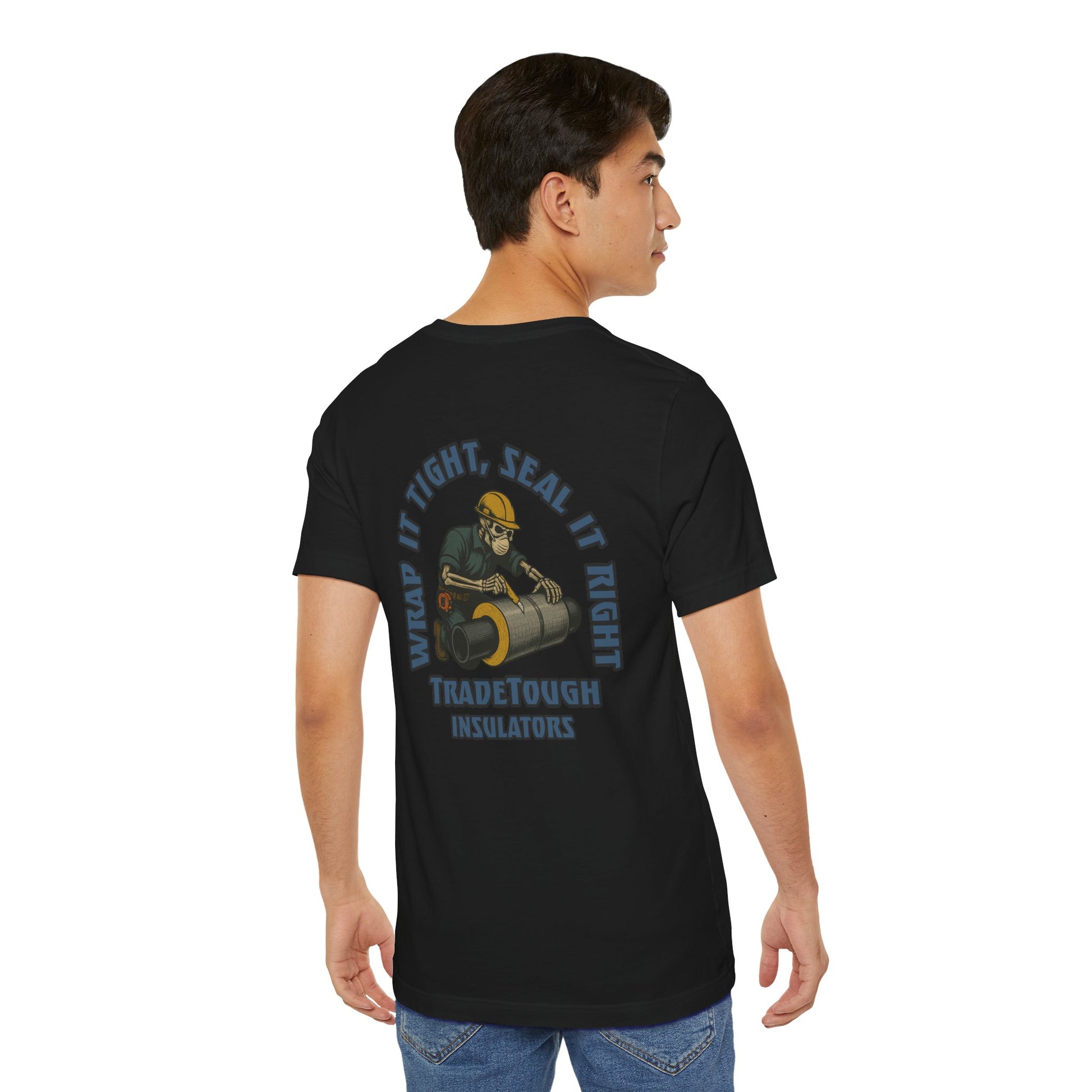 Person wearing a black t-shirt with a graphic and text on the back, standing against a white background