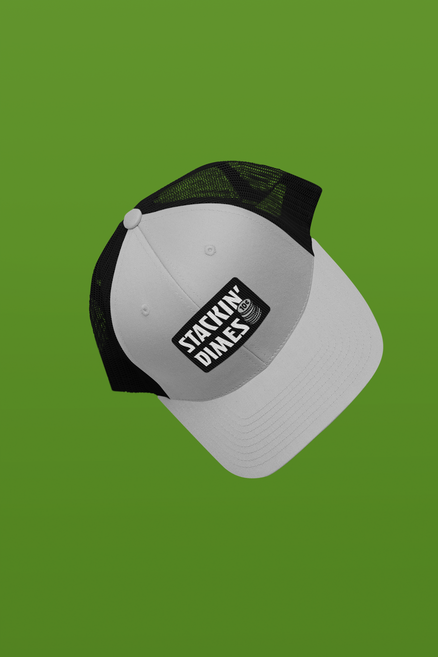 Gray and black cap with 'Stackin Dimes' logo on a green background
