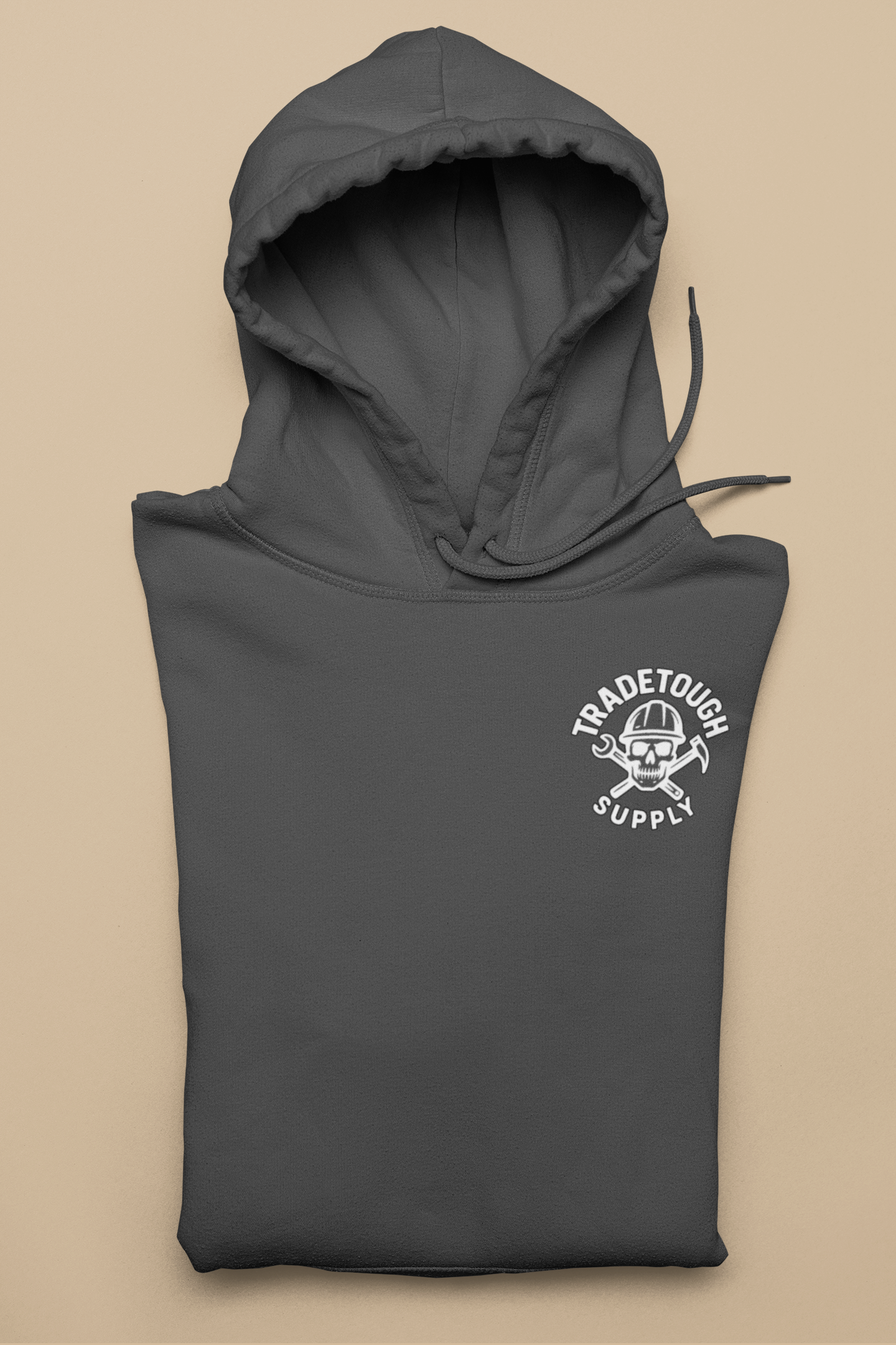 Detailed view of TradeTough skull and tools chest logo

