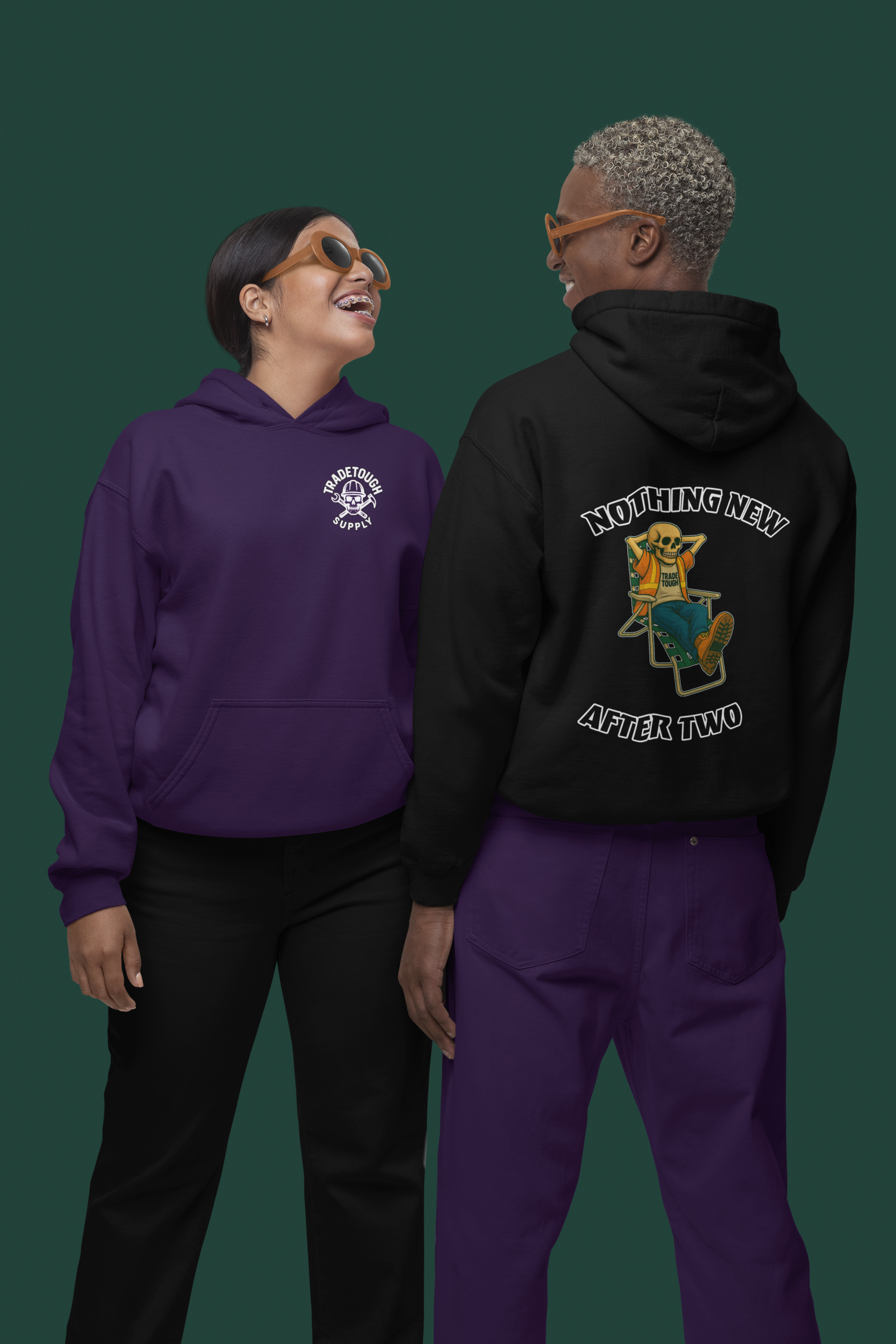 Two people wearing hoodies with graphic designs on a transparent background