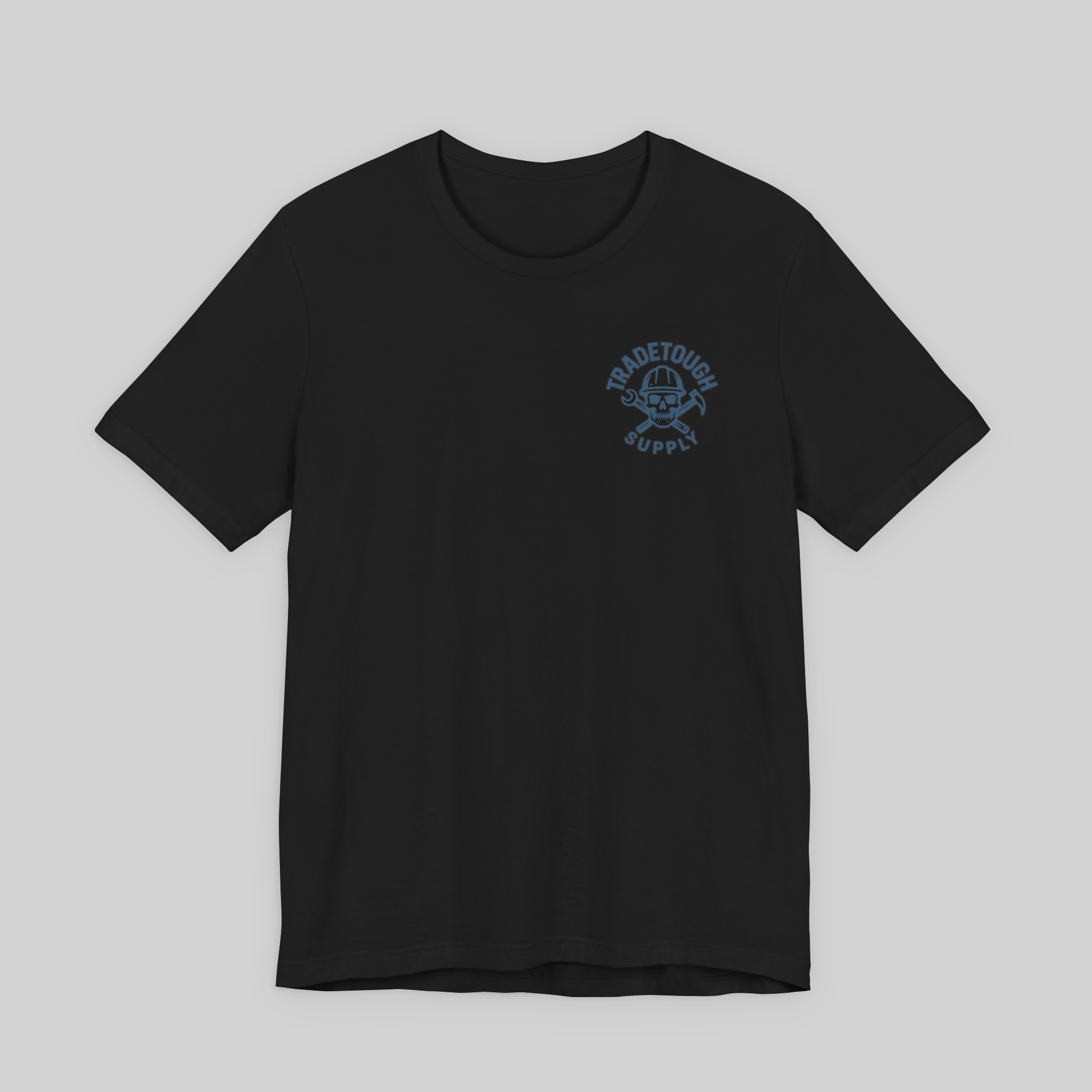 Black Insulator T-shirt with TradeTough Supply logo printed on left chest in Industrial Blue, gritty workwear style for tradesmen. Cotton blend with classic fit for jobsite durability and comfort.