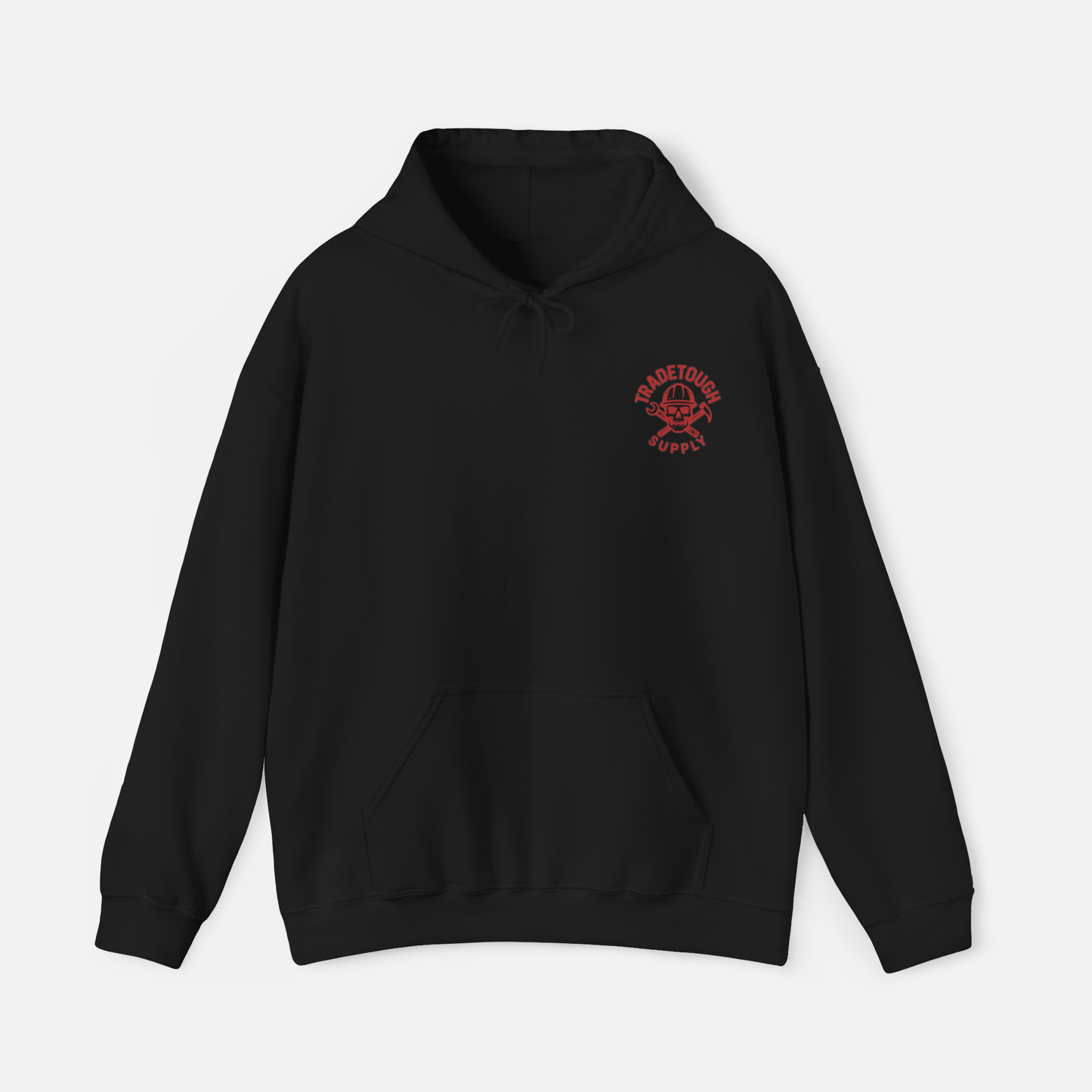 Flat lay of black hoodie with TradeTough logo on the chest, gritty and clean