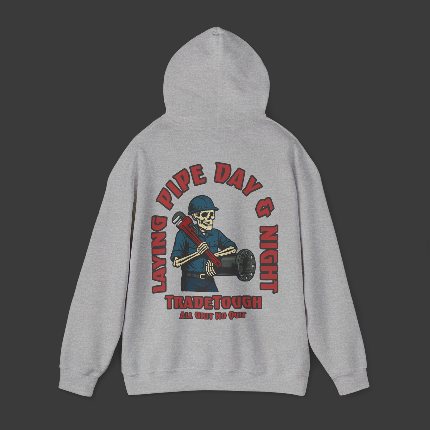 Gray hoodie with a graphic design on the back featuring a skeleton wearing a hard hat and holding tools, with text 'Laying Pipe Day & Night' and 'Travedough'.