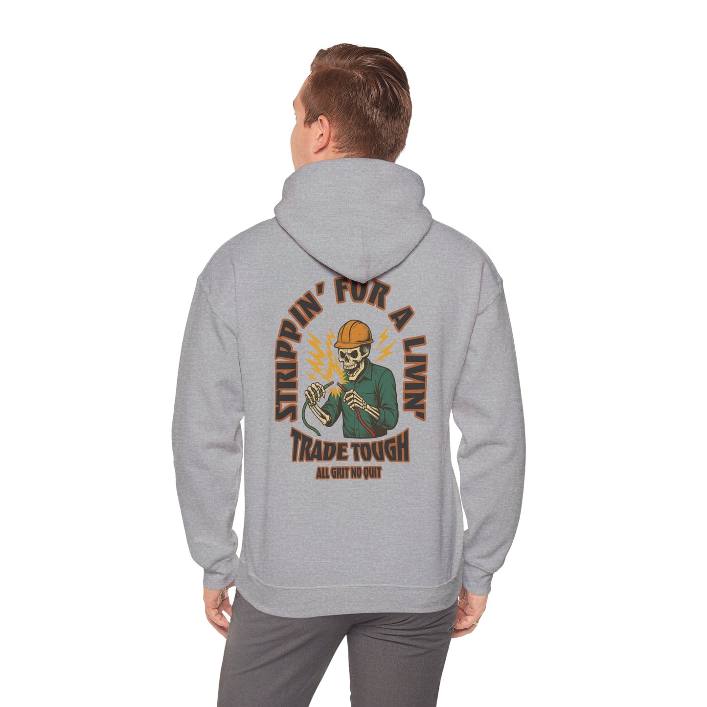 Person wearing a gray hoodie with a graphic design on the back against a white background