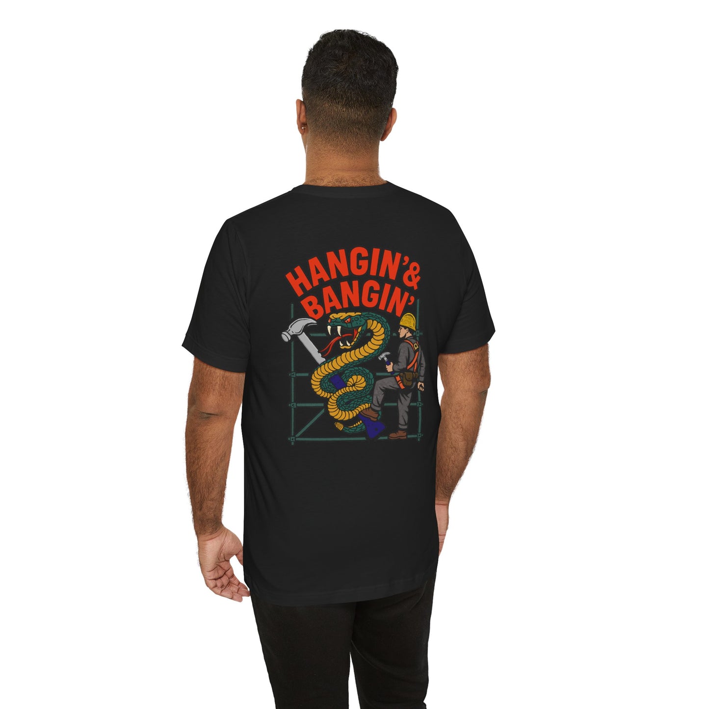Person wearing a black t-shirt with a graphic design and text on the back, on a white background